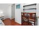 Office area with built in shelves and tiled floors at 1000 Cove Cay Dr # 5E, Clearwater, FL 33760