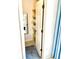 Bedroom closet with shelving for linen and storage at 1727 Waxwing Cir, Venice, FL 34293