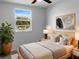 Bright bedroom with a neutral palette, large window, modern decor, and a cozy, inviting atmosphere at 3305 Acapulco Dr, Riverview, FL 33578