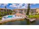 Scenic aerial view of the property showcasing the swimming pool and waterfront location at 3672 Lake Bayshore Dr # K327, Bradenton, FL 34205