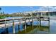 Picturesque fishing pier with shaded seating and tranquil lake views at 3672 Lake Bayshore Dr # K327, Bradenton, FL 34205