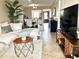 Comfortable living room flowing to the dining area, featuring modern decor and an open layout at 3672 Lake Bayshore Dr # K327, Bradenton, FL 34205