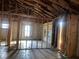 Interior view of a house under construction with exposed framing and unfinished surfaces at 7342 Skyview Ave, New Port Richey, FL 34653