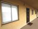 Condo entrance featuring unit 327, neutral paint, a secure door, and a welcome mat at 3672 Lake Bayshore Dr # K327, Bradenton, FL 34205
