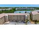 Condo exterior with ample parking, well-maintained facade and waterfront location at 3672 Lake Bayshore Dr # K327, Bradenton, FL 34205