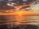 Beautiful water view of a sunset with orange and gray clouds at 3672 Lake Bayshore Dr # K327, Bradenton, FL 34205