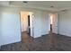 Spacious main bedroom with recessed lighting and doors leading to ensuite bathroom at 25164 Calusa Dr, Punta Gorda, FL 33955