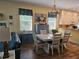 Inviting dining room featuring an art piece above the buffet and neutral paint at 424 N Carolina Ave, Palm Harbor, FL 34683