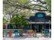 Charming commercial building with inviting outdoor seating, perfect for a restaurant or brewery at 424 N Carolina Ave, Palm Harbor, FL 34683