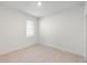 Vacant bedroom featuring wood-look flooring, and a single window at 467 Sun Chaser Dr, Nokomis, FL 34275