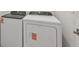 Laundry area featuring a modern washer and dryer set for convenient chores at 467 Sun Chaser Dr, Nokomis, FL 34275