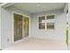 Covered back patio providing the perfect space for outdoor seating and entertaining at 467 Sun Chaser Dr, Nokomis, FL 34275