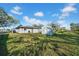 Spacious backyard featuring a shed and ample green space, perfect for outdoor activities and storage at 1616 39Th Avenue E Dr, Ellenton, FL 34222