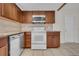 Kitchen featuring granite countertops, modern stainless appliances, and ample cabinet storage at 1616 39Th Avenue E Dr, Ellenton, FL 34222