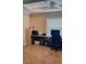 Bright office space with tiled floors, ceiling fan, and large window providing natural light at 23149 Hammond Ave, Port Charlotte, FL 33954