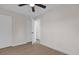 Bright bedroom featuring ceiling fan, closet space and a door leading to another room at 3445 40Th N St, St Petersburg, FL 33713