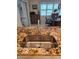 Modern kitchen sink featuring a stainless steel sink and granite countertops at 1706 S Lakeside Ct, Venice, FL 34293