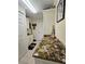 Laundry room features stone countertops, nautical decor and storage at 1706 S Lakeside Ct, Venice, FL 34293
