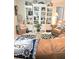 Coastal living space featuring nautical decor, comfortable seating, and a cozy atmosphere at 1706 S Lakeside Ct, Venice, FL 34293