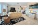 Cozy living room offering ample space for relaxation and comfortable living at 1706 S Lakeside Ct, Venice, FL 34293