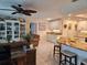 Spacious open floor plan seamlessly connecting the living room and kitchen areas at 1706 S Lakeside Ct, Venice, FL 34293