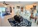 Bright and airy living room with comfortable seating and easy access to the dining area at 1706 S Lakeside Ct, Venice, FL 34293