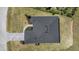 Aerial view of the home featuring a dark roof and landscaping at 218 Soursop, Punta Gorda, FL 33955