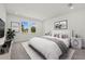 Serene main bedroom with soft textures, ambient lighting, and a bright window view at 218 Soursop, Punta Gorda, FL 33955