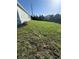 Large grassy backyard with green spaces at 7343 N Ficus Tree, Punta Gorda, FL 33955