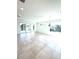 Open concept living room with tile flooring, recessed lighting and large sliding glass doors to the outdoors at 7343 N Ficus Tree, Punta Gorda, FL 33955