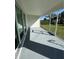 Covered and screened patio with access to backyard at 7343 N Ficus Tree, Punta Gorda, FL 33955