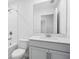 Bathroom featuring a shower over tub, vanity with a quartz countertop, and modern fixtures at 1844 Draughton Dr, Zephyrhills, FL 33541