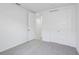 Bedroom features plush carpet, a large closet, and neutral paint at 1844 Draughton Dr, Zephyrhills, FL 33541