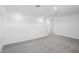 Large bonus room features plush carpet, recessed lighting, and a lot of natural light at 1844 Draughton Dr, Zephyrhills, FL 33541