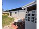 Relaxing backyard patio area, ideal for outdoor gatherings and enjoying the peaceful scenery at 201 Ravenna N St, Nokomis, FL 34275
