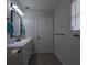 Modern bathroom featuring vanity with a large mirror at 201 Ravenna N St, Nokomis, FL 34275