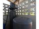 Water treatment system housed outdoors, including tanks, filters, and control panel at 201 Ravenna N St, Nokomis, FL 34275