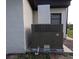 Side of house with AC unit at 201 Ravenna N St, Nokomis, FL 34275