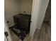 Laundry room features front loading washer and dryer with a modern rug at 201 Ravenna N St, Nokomis, FL 34275