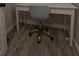 White desk with drawers and a blue chair with gold base at 201 Ravenna N St, Nokomis, FL 34275