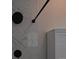 Shower featuring marble tiling and a modern matte black shower head at 201 Ravenna N St, Nokomis, FL 34275