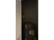 This utility closet features the home's water heater at 201 Ravenna N St, Nokomis, FL 34275