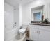 Bathroom featuring a combination tub and shower at 36495 Garden Wall Way, Zephyrhills, FL 33541