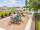 Community playground featuring multiple slides and climbing structures at 36495 Garden Wall Way, Zephyrhills, FL 33541