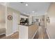 Modern kitchen featuring granite countertops, stainless steel appliances, and a breakfast bar seating area at 116 S Obrien St, Tampa, FL 33609