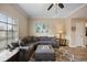 Inviting living room showcasing a large comfortable sectional sofa, soft rug, and stylish decor at 116 S Obrien St, Tampa, FL 33609