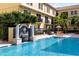 Beautiful pool area with a water feature and resort-style landscaping at 116 S Obrien St, Tampa, FL 33609