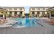 A sparkling community pool offers a refreshing escape with ample lounge seating and inviting water features at 116 S Obrien St, Tampa, FL 33609