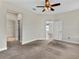 Spacious main bedroom featuring doorways to the en suite and a walk-in closet at 5485 Sunset Falls Dr, Apollo Beach, FL 33572