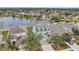 Aerial view of the home and pond, showcasing the property's setting in the community at 15121 Searobbin Dr, Lakewood Ranch, FL 34202